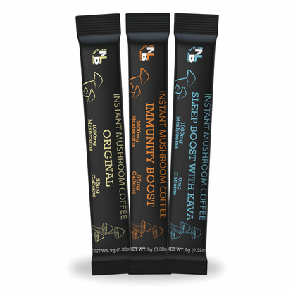 Three free instant mushroom coffee sample packets on a white background